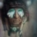 Native American Sculpture on fur in shadow box
