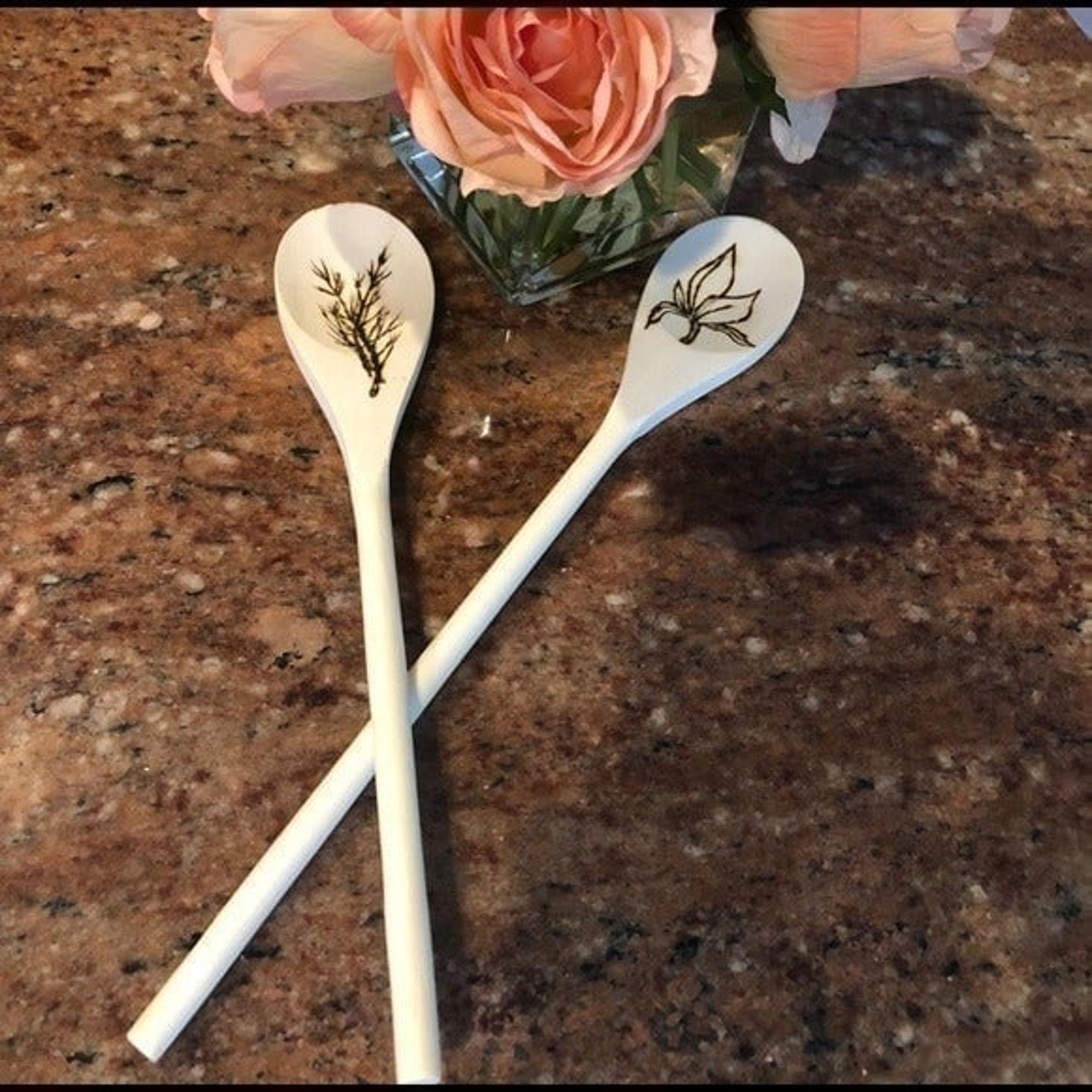 2 wood burned spoon set.