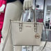 Michael Kors Jet Set Travel Extra-Small Top-Zip Tote Carryall Bag Light Cream
