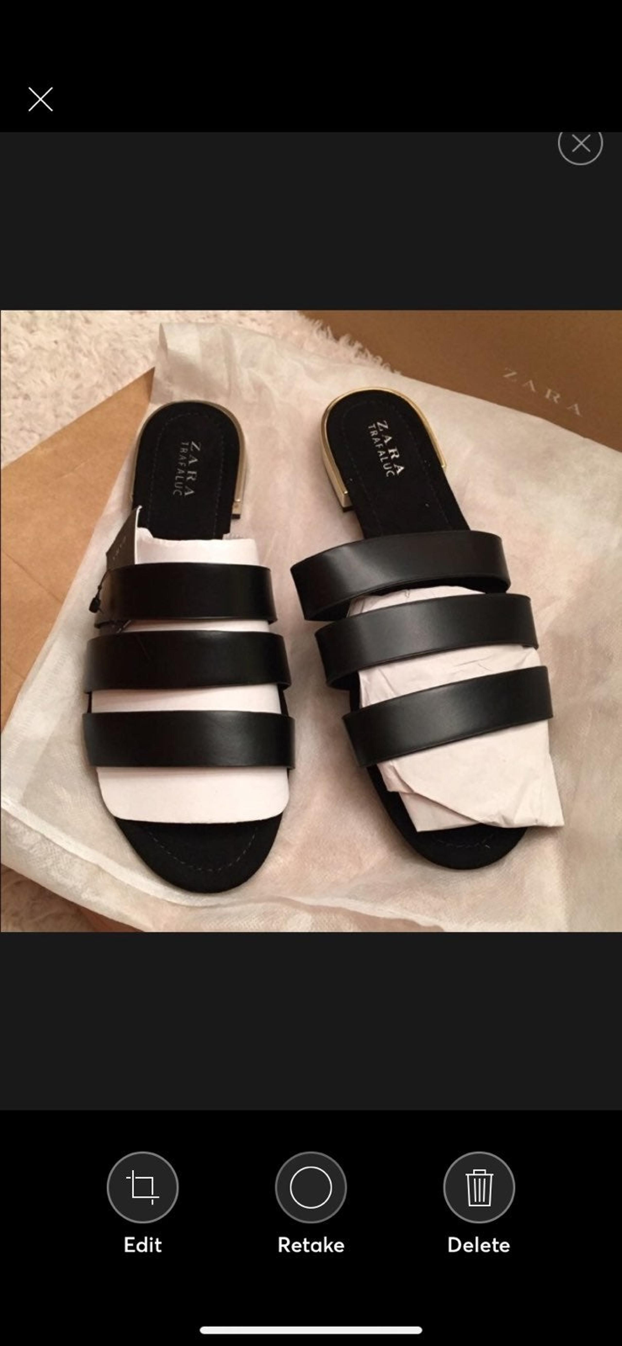 Zara black mules with metallic heel.