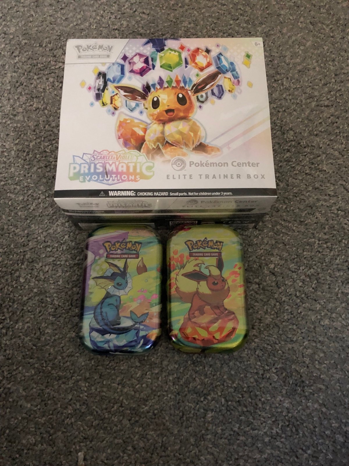 PRISMATIC EVOLUTIONS Pokemon Center ETB + flareon Mini tin & vaporeon mini tin