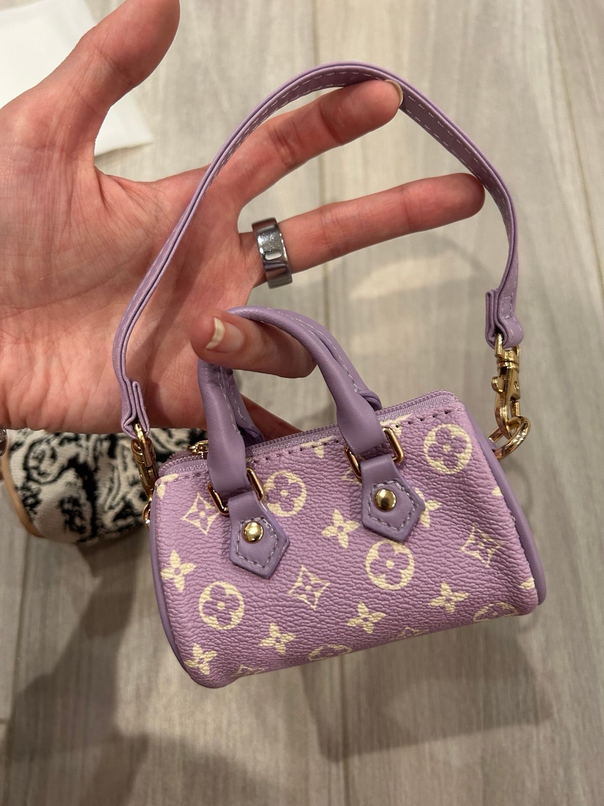 Purple tube bag charm