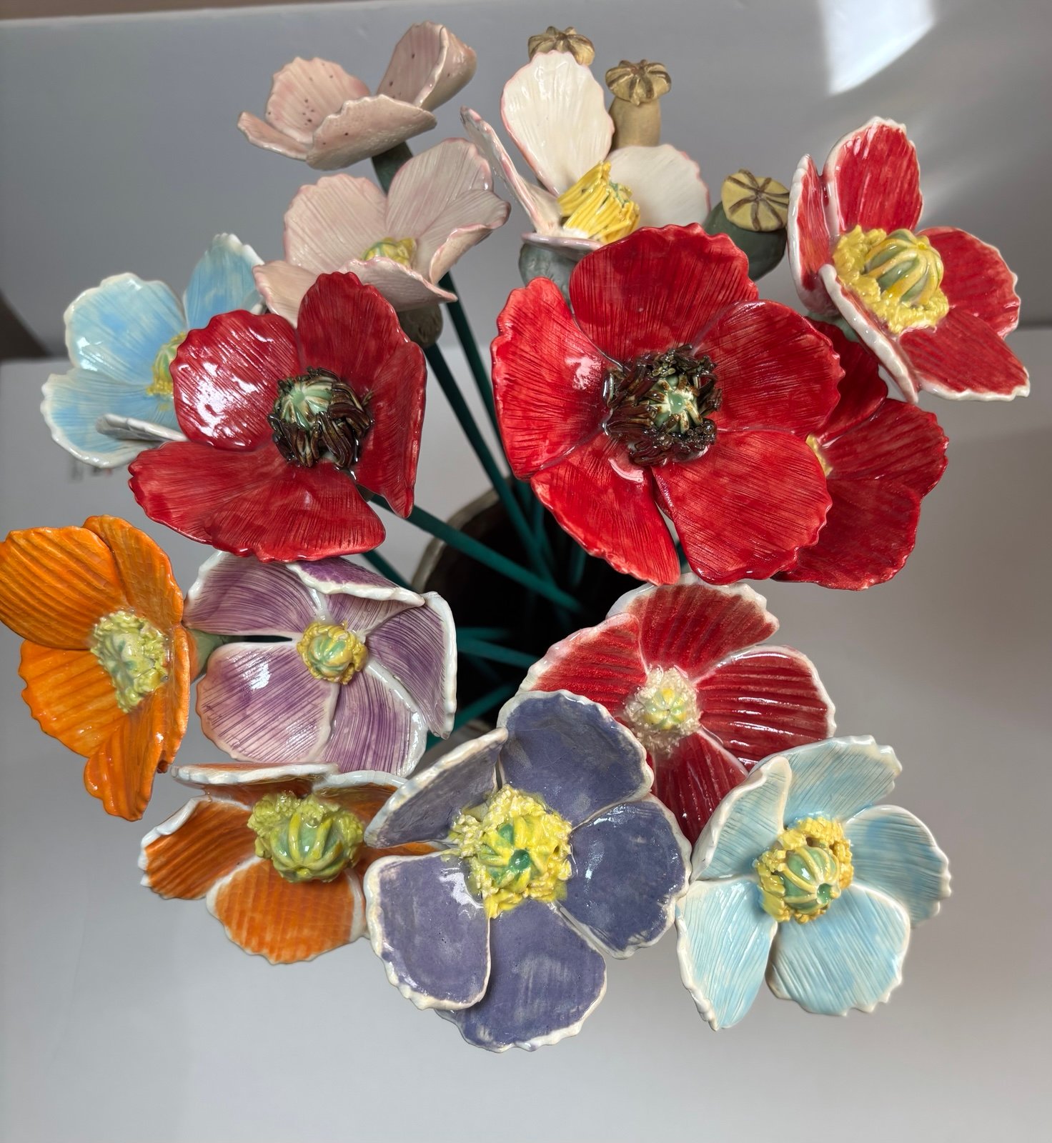 Ceramic poppy flowers and anthuriums
