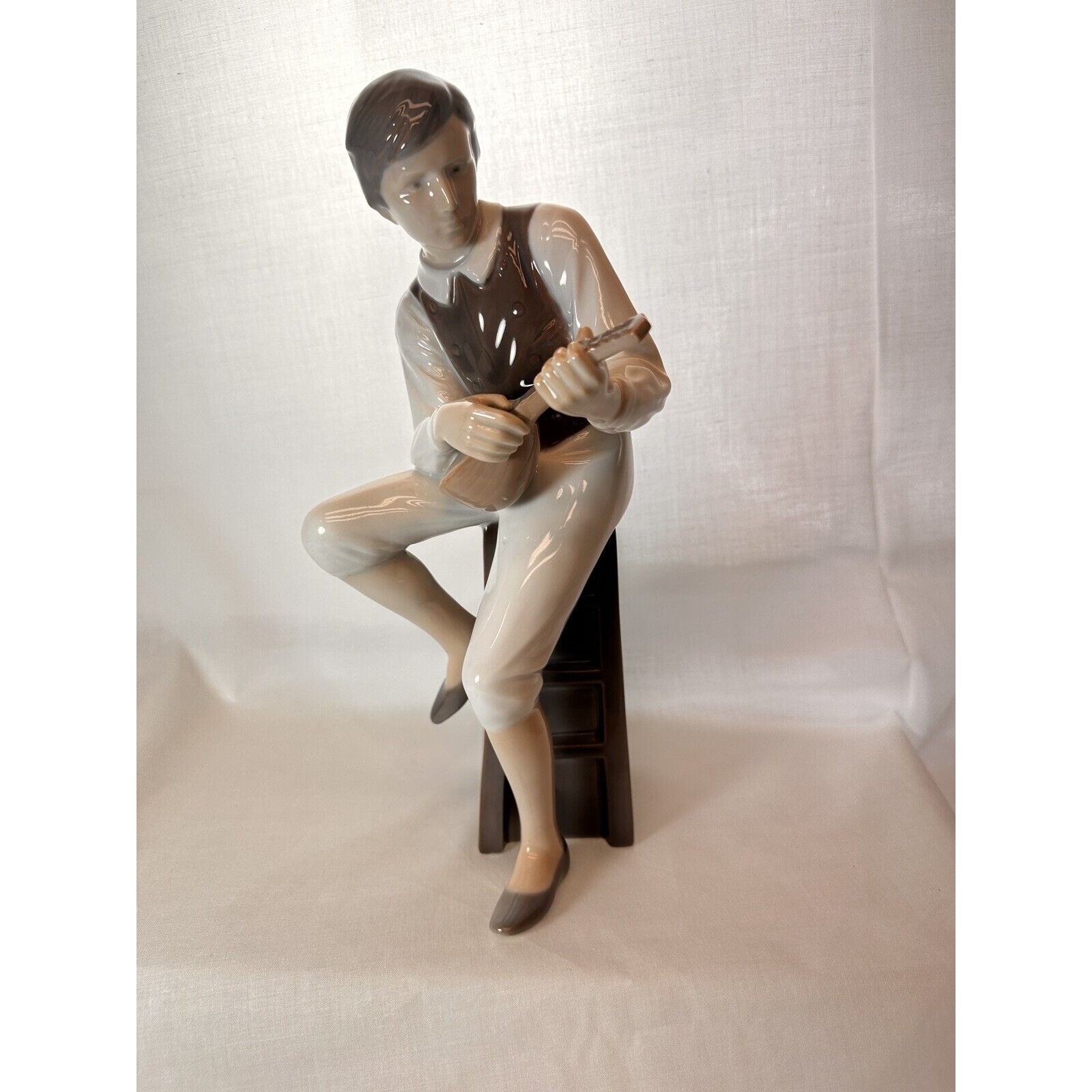 B & G- Bing & Grondahl Boy Playing Mandolin 11.25 in.-Exc. Condition