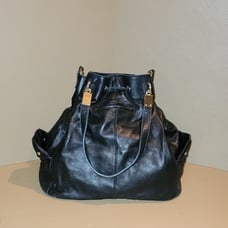 VINTAGE BLACK GENUINE LEATHER JUICY COUTURE BUCKET PURSE WITH CROSSBODY STRAP