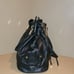VINTAGE BLACK GENUINE LEATHER JUICY COUTURE BUCKET PURSE WITH CROSSBODY STRAP