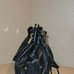 VINTAGE BLACK GENUINE LEATHER JUICY COUTURE BUCKET PURSE WITH CROSSBODY STRAP
