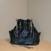 VINTAGE BLACK GENUINE LEATHER JUICY COUTURE BUCKET PURSE WITH CROSSBODY STRAP