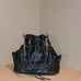 VINTAGE BLACK GENUINE LEATHER JUICY COUTURE BUCKET PURSE WITH CROSSBODY STRAP