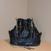VINTAGE BLACK GENUINE LEATHER JUICY COUTURE BUCKET PURSE WITH CROSSBODY STRAP