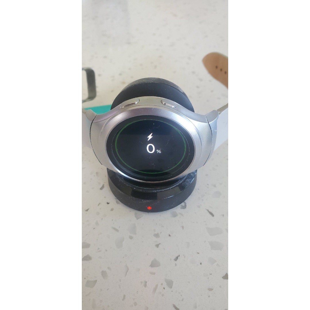 Samsung Gear S2 Watch and charger.