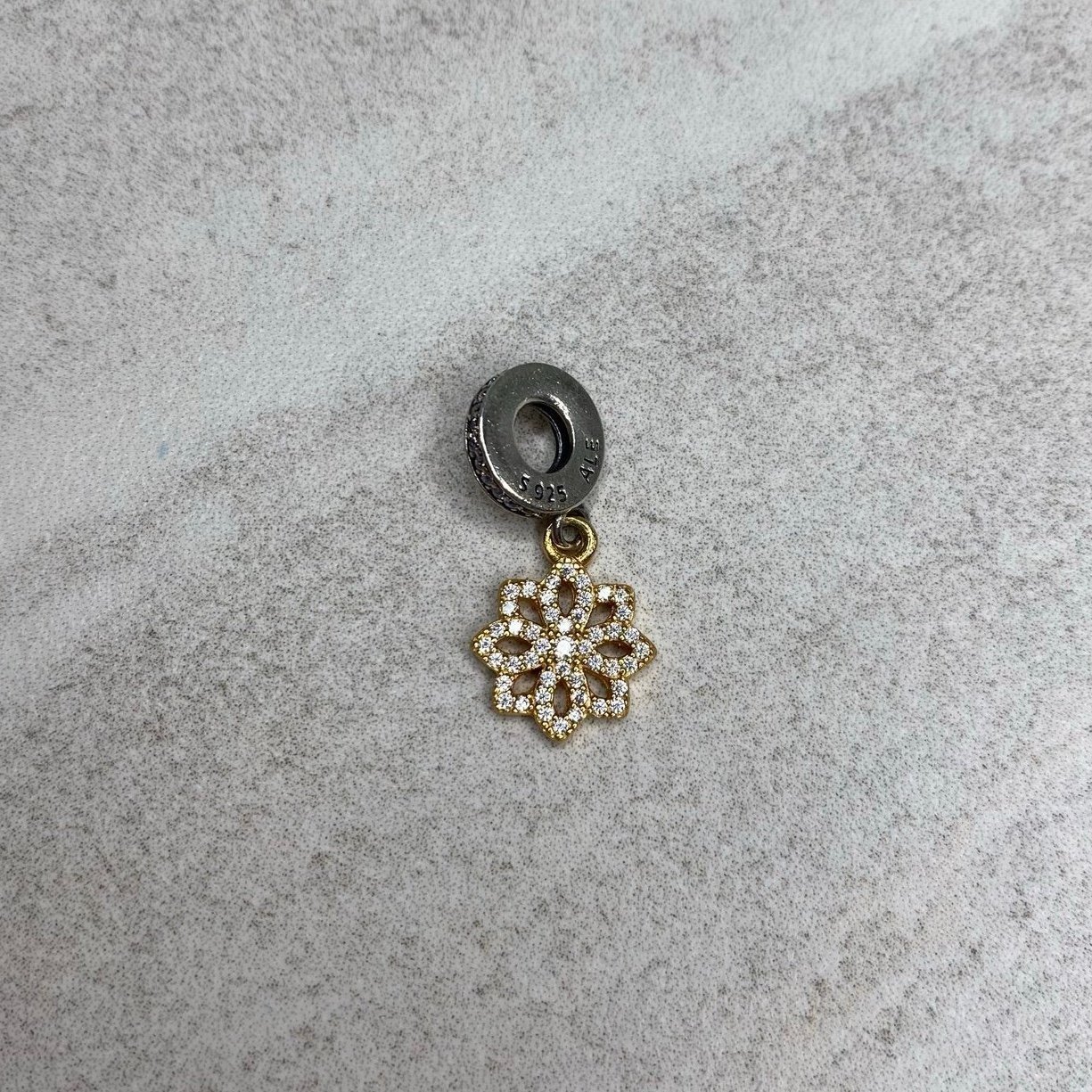 Silver Gold Snowflake Dangle charm.