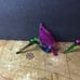 Set of three beautiful colored glass, hummingbird ornaments
