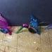 Set of three beautiful colored glass, hummingbird ornaments