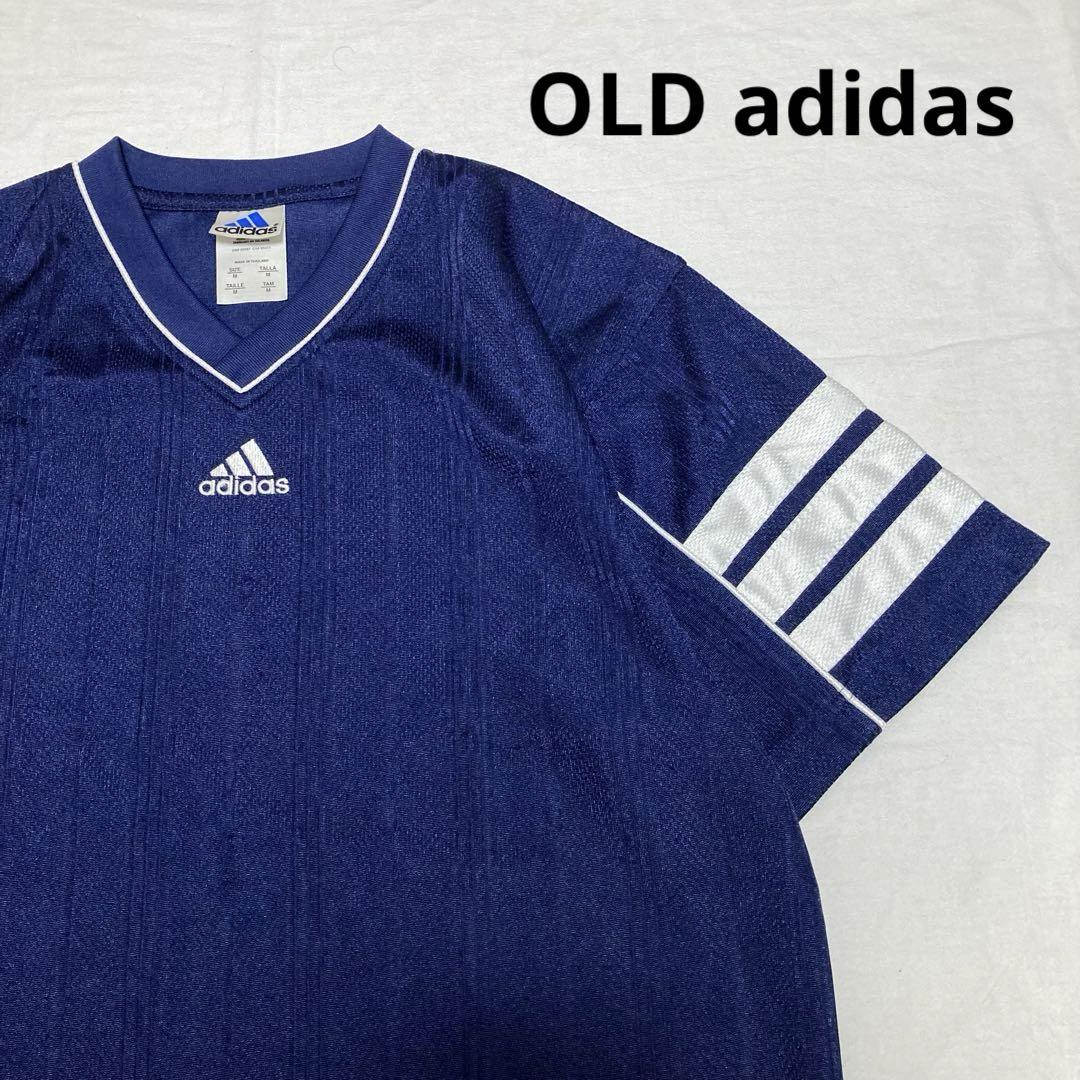 Old Adidas V-neck navy game shirt, jersey. Size equivalent to XL.