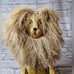 Pier 1 sitting lion bookshelf mantle decoration