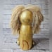 Pier 1 sitting lion bookshelf mantle decoration