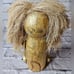 Pier 1 sitting lion bookshelf mantle decoration