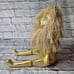 Pier 1 sitting lion bookshelf mantle decoration