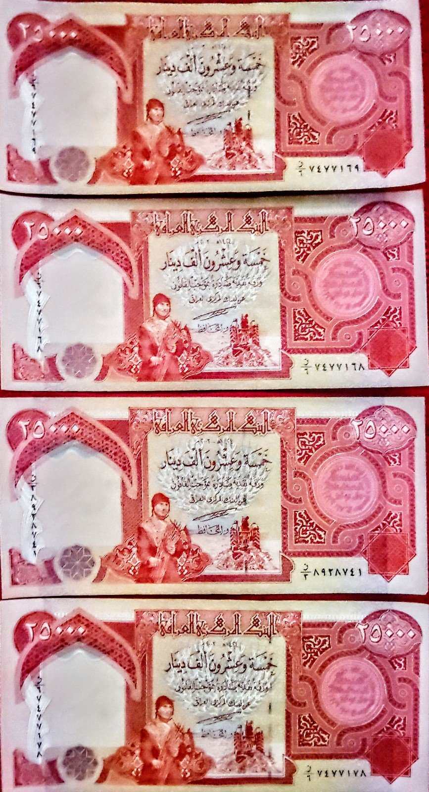 UNCIRCULATED Lot of 4 Iraqi dinar notes