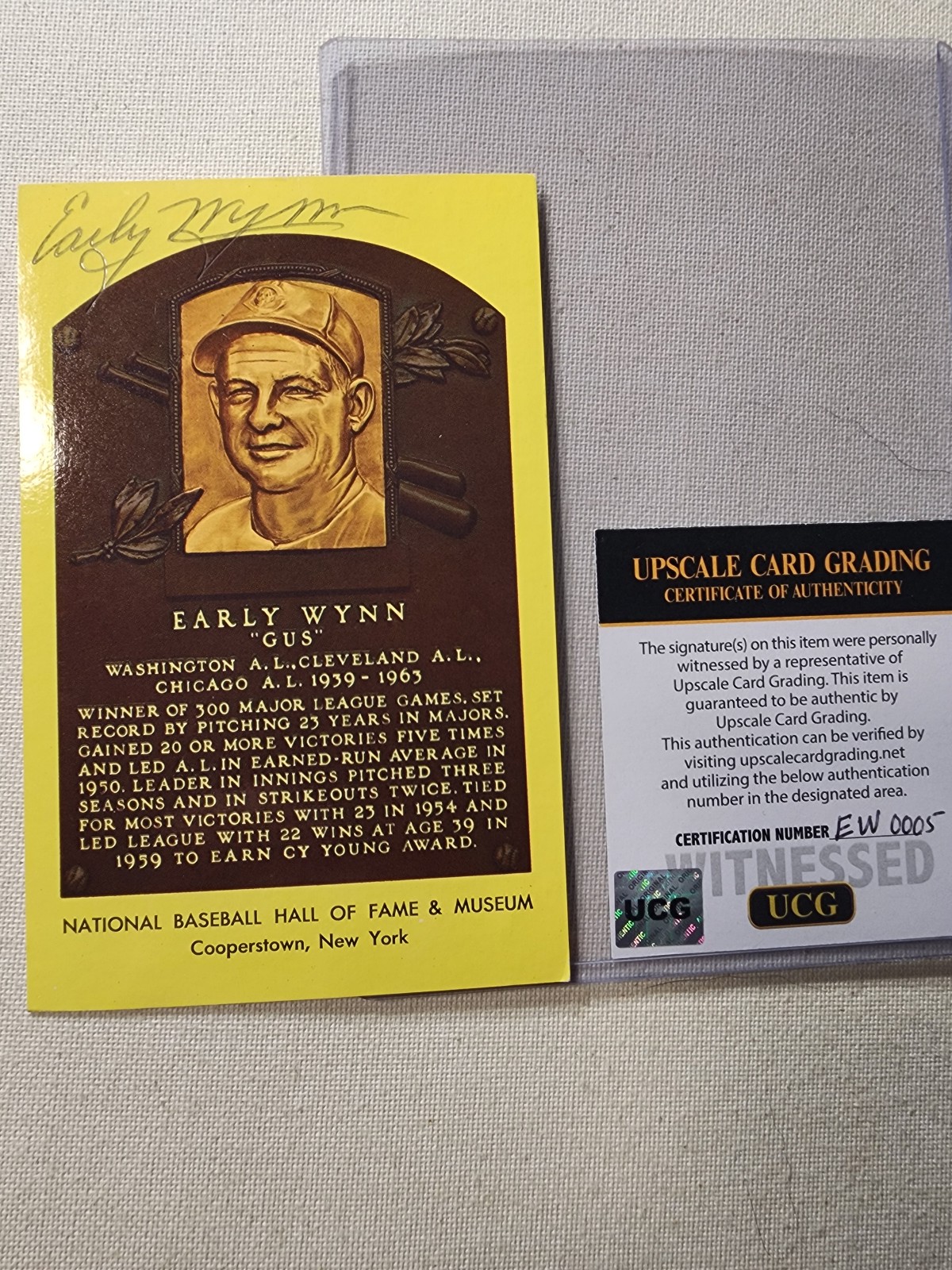 EARLY WYNN Signed HOF Postcard-HALL OF FAME-CLEVELAND W/UCG COA & TOP LOADER