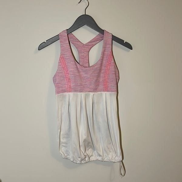Lululemon Racer Back Tank with drawstring waist. Size tag missing. Pink/White