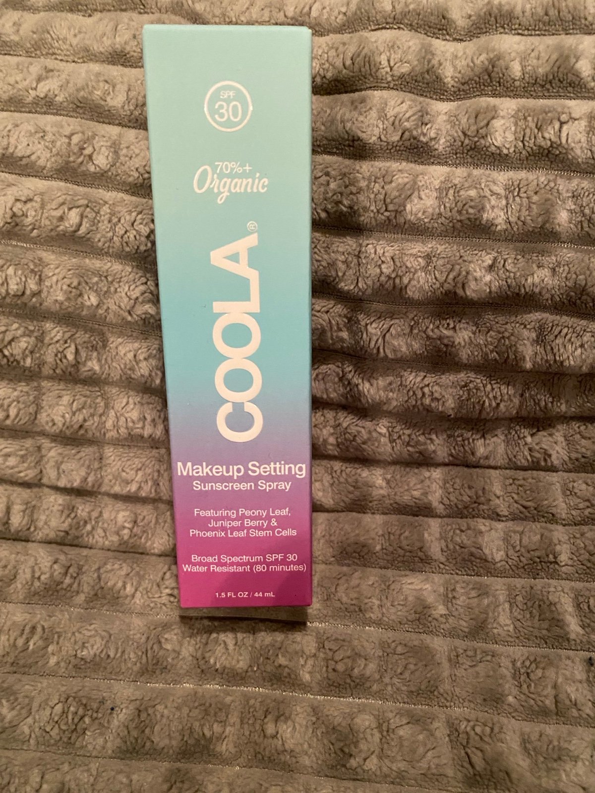 Coola makeup setting sunscreen spray