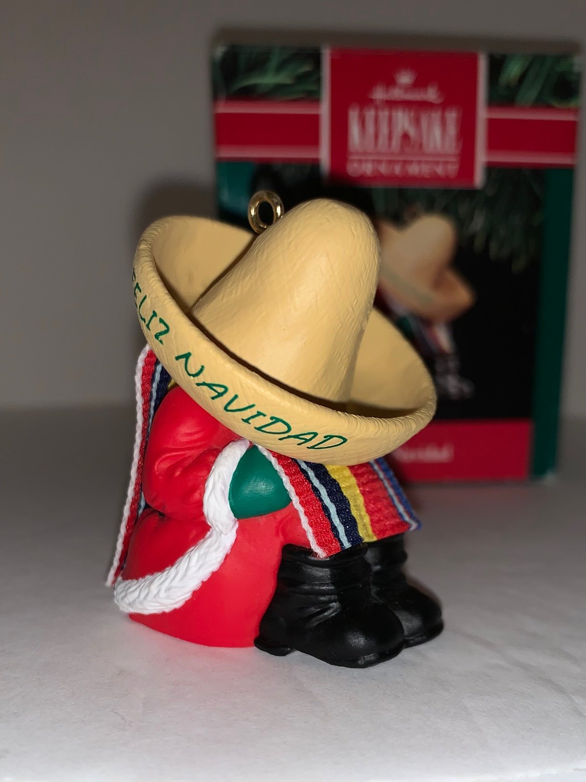 1991 Hallmark Feliz Navidad Keepsake Ornament. Santa wearing a sombrero. New
