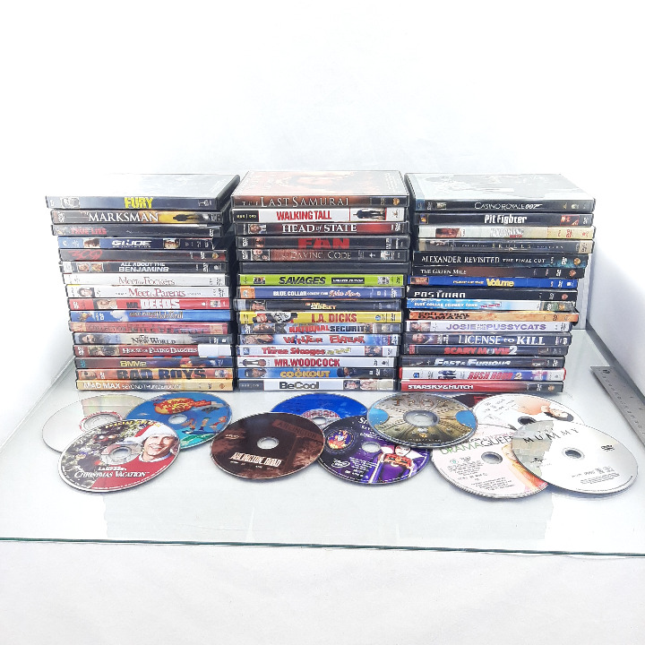 You will get all DVD's pictured 48 in cases and 11 loose discs
