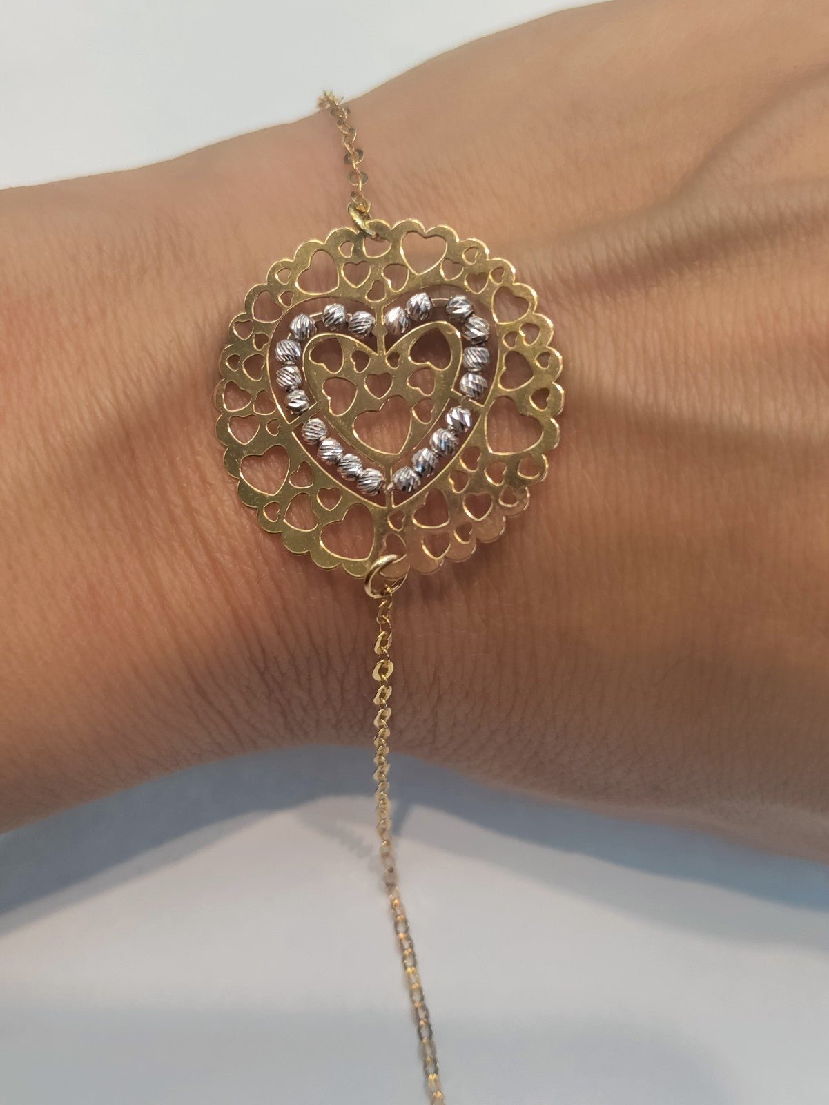 18k gold heart adjustable bracelet 7.5 -8.25 inches