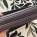 Tumi TUMI Double Zip-Around Clutch leather