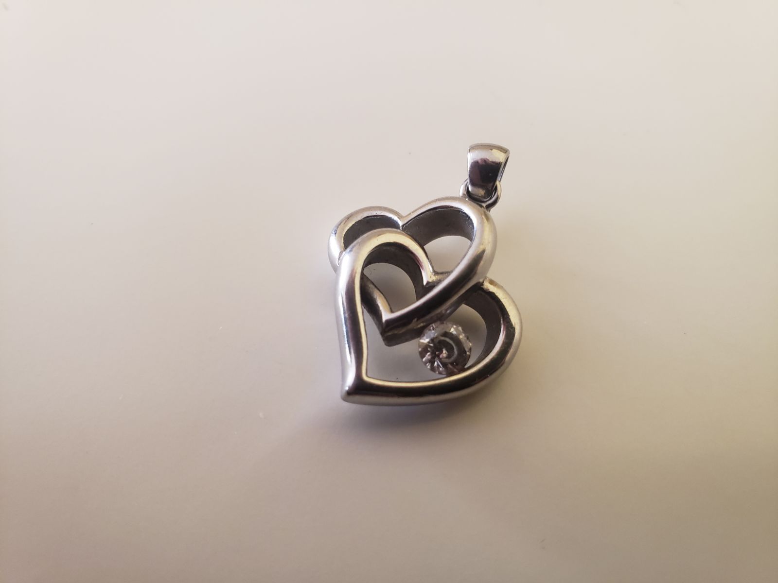 Heart pendant charm necklace.