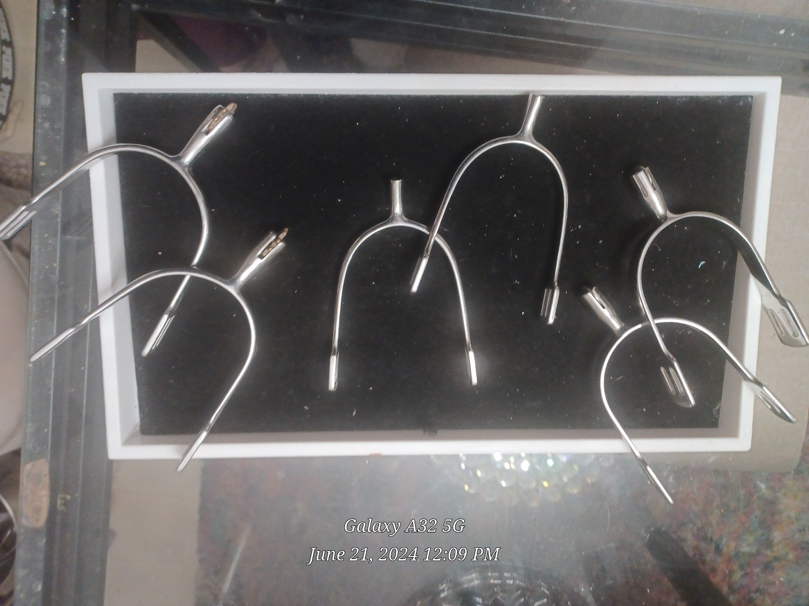 Three pairs of English show, hunting spurs