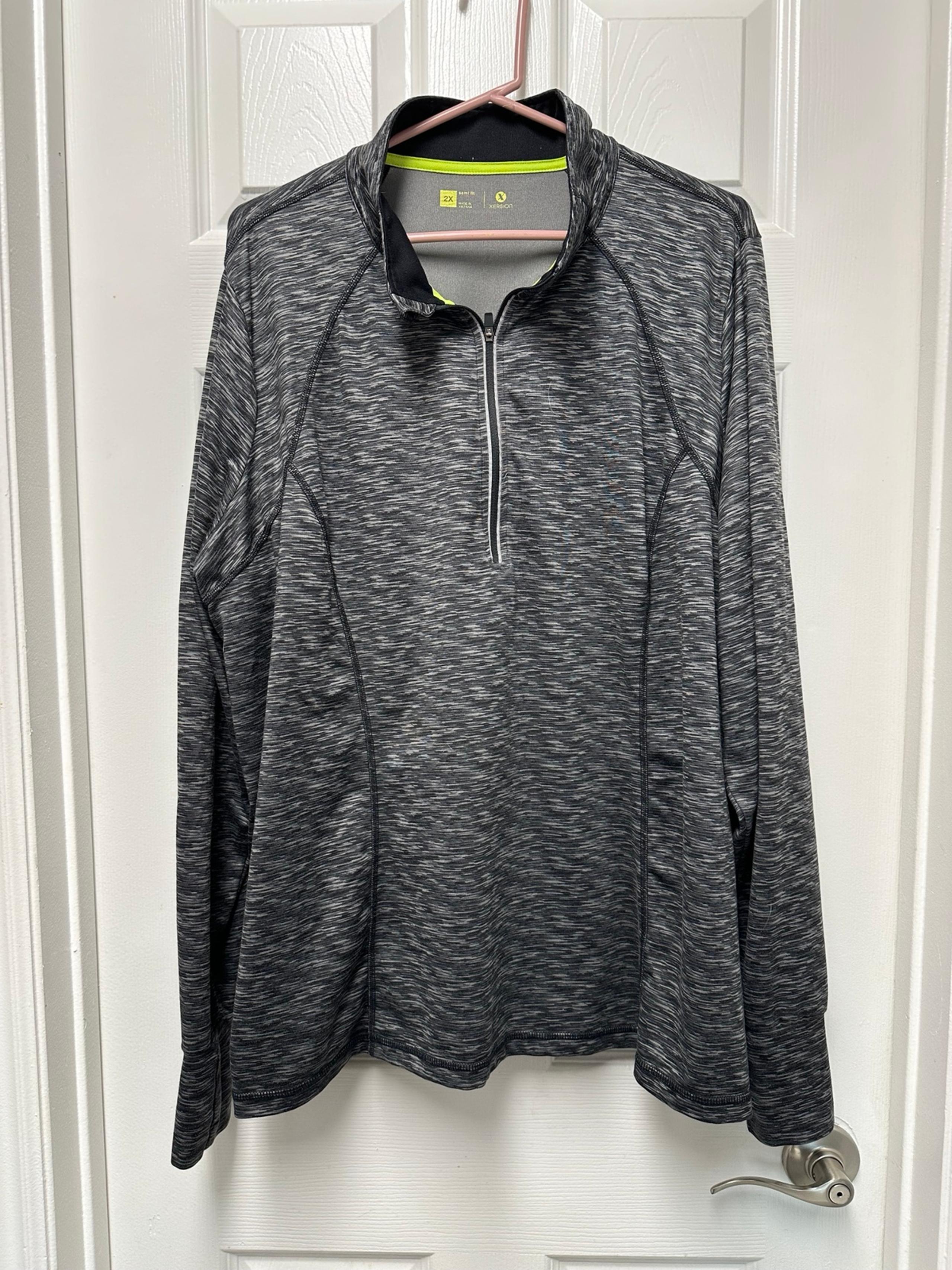 Black and grey Xersion 3/4 zip front women’s top