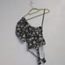 Free People Black Floral Print Somethin Bout You One Shoulder Bodysuit Sz XS NWT