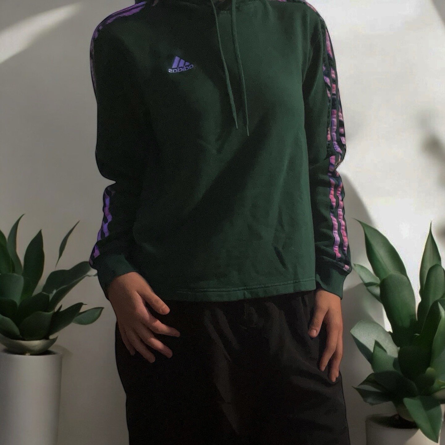 Adidas green hoodie with purple and pink stripes on sleeves