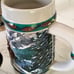 FOUR COLLECTIBLE BEER MUGS