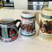 FOUR COLLECTIBLE BEER MUGS