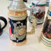FOUR COLLECTIBLE BEER MUGS