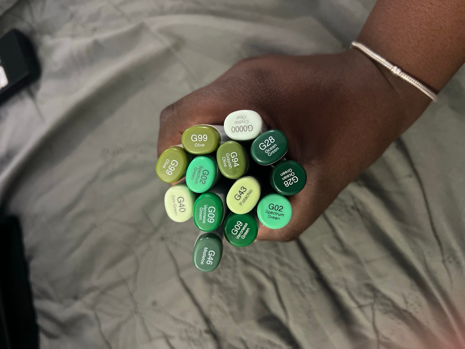 10 green copic sketch markers and 3 refills