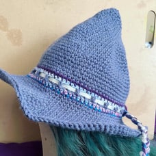 Crocheted purple witch hat