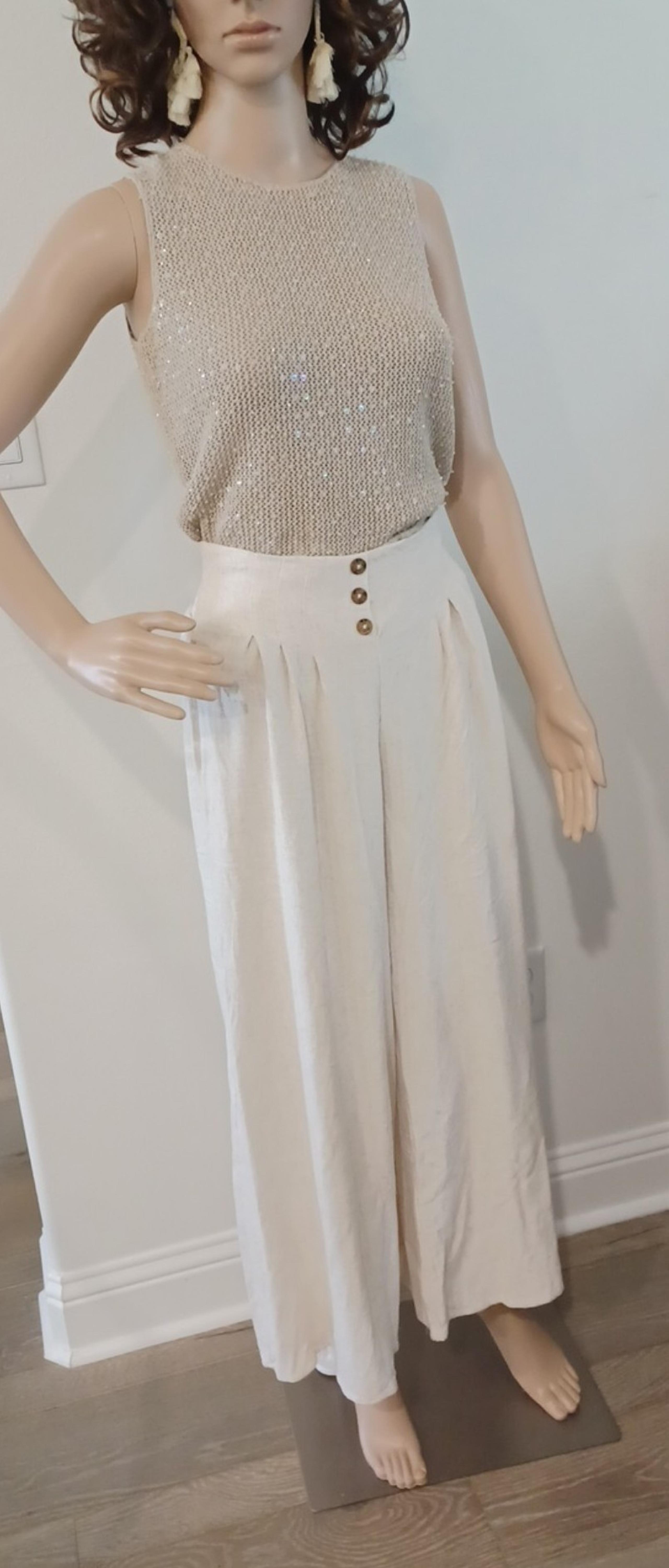 Emanuel Ungaro top, Sienna SKY pants + earrings