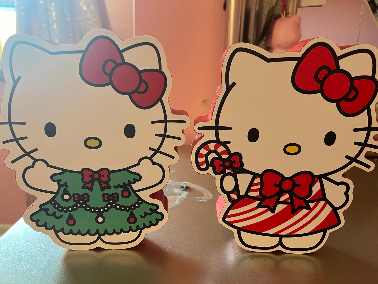 Two Hello Kitty decorations