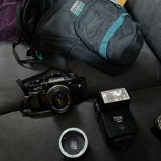 Olympus OMPC 35mm SLR with Olympus OM-System 50mm F1.8 lens