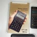 HEWLETT-Packard HP- 14B Business Calculator With Manual & sleeve