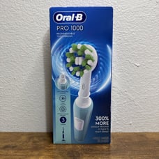 Oral-B Pro 1000 Rechargeable Toothbrush with Handle Charger & Brush Head NEW