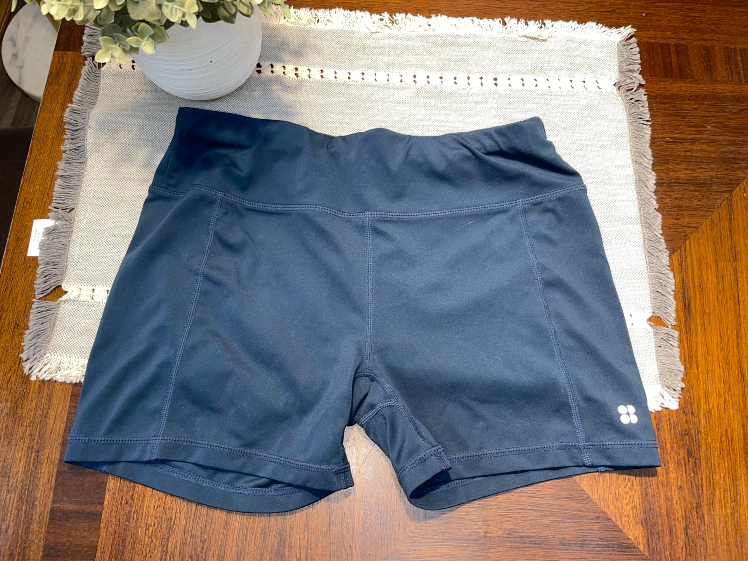 Woman’s size large sweaty Betty navy blue biker shorts