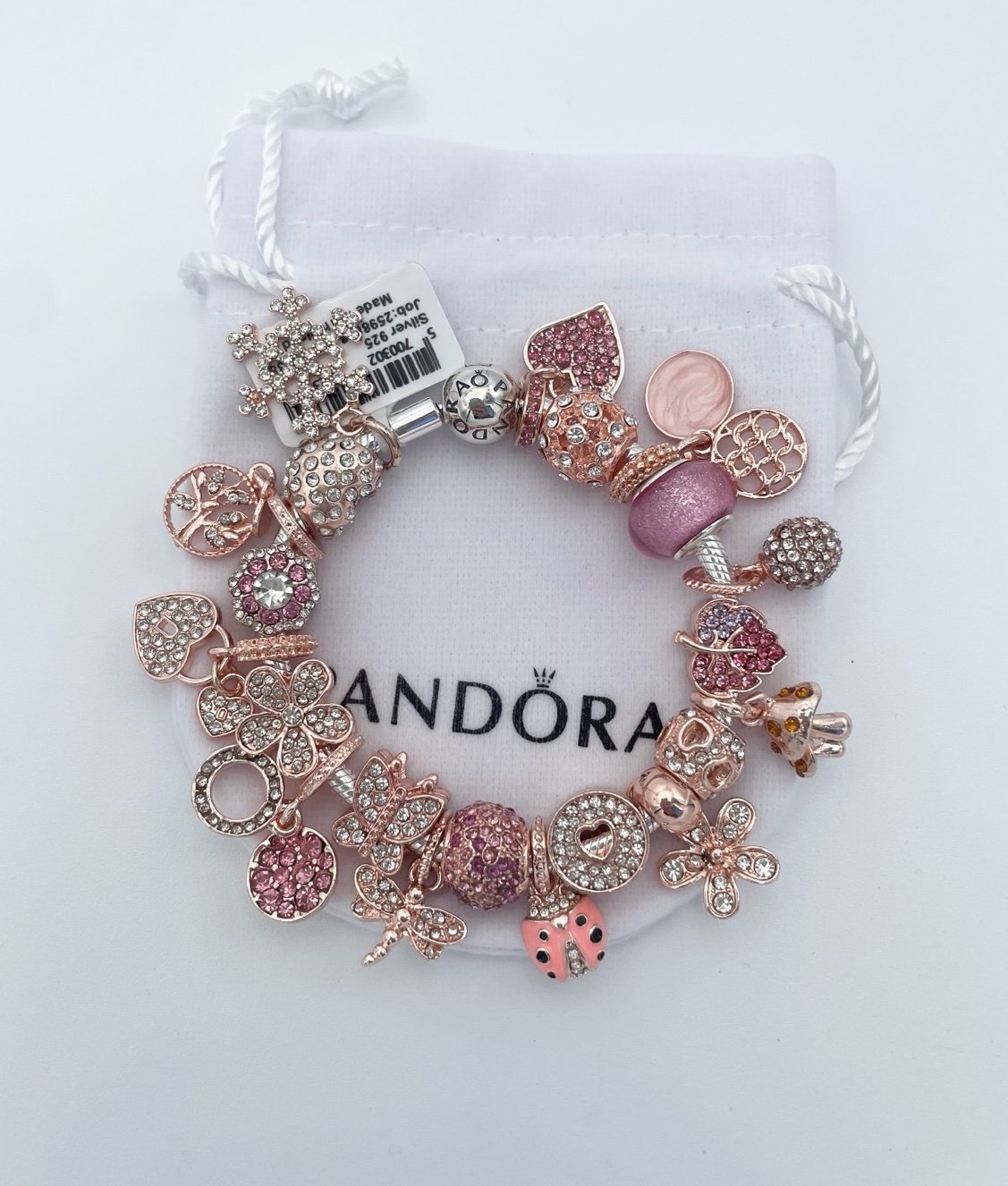 Pandora Bracelet with Rose Gold and Pink Zircon Themed Charms