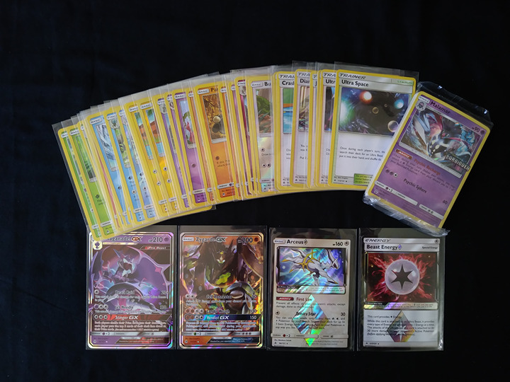 SM Forbidden Light, 40+ Pokémon TCG card lot (J4942)