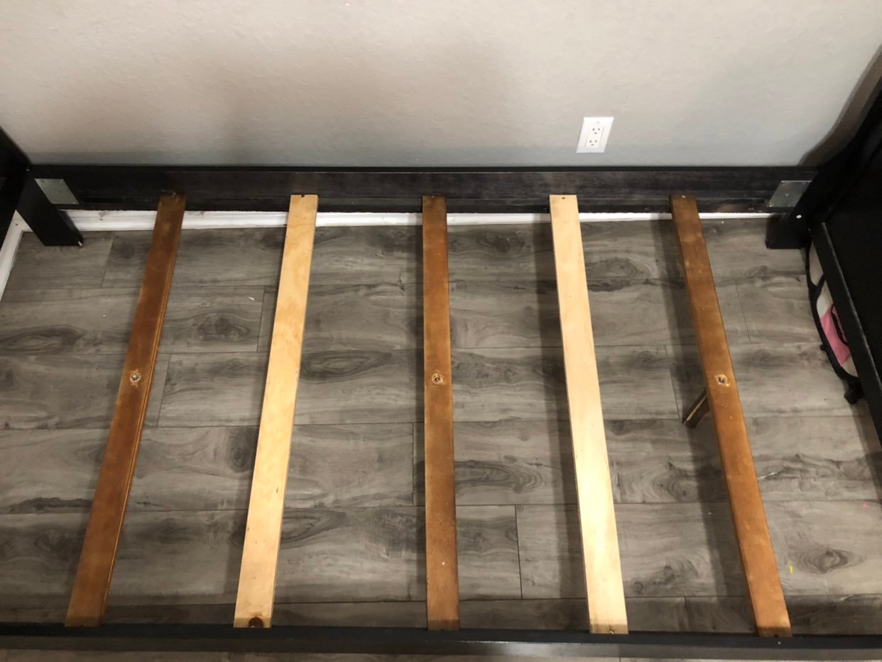 A twin black bed